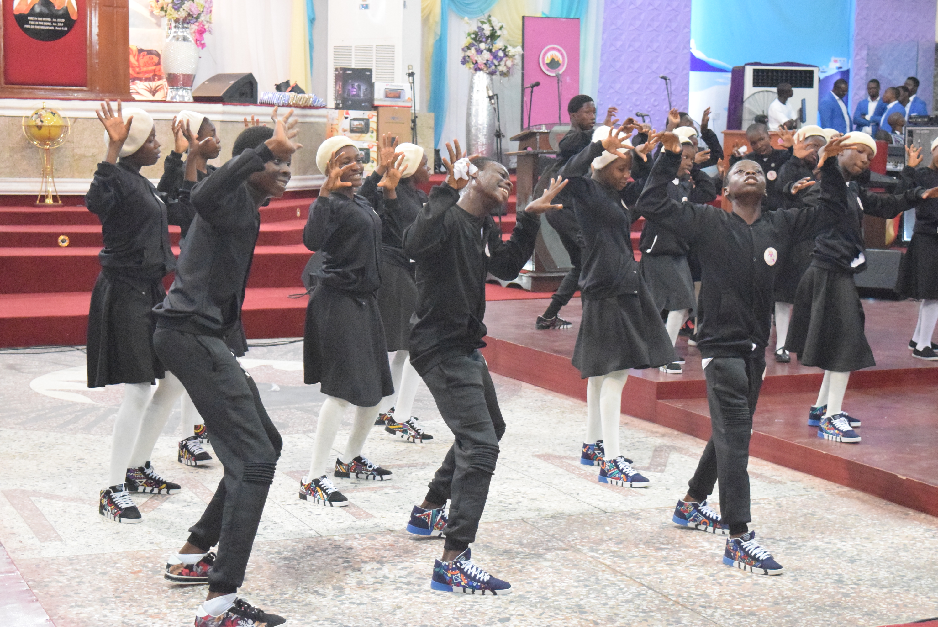 Dancers preparing backstage for ministry presentation